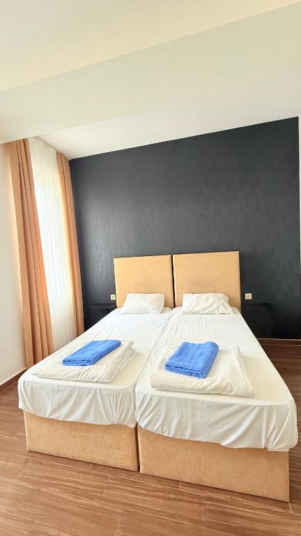 Postel nebo postele na pokoji v ubytování StarHostel