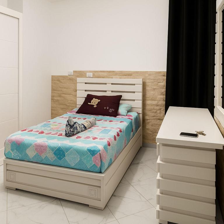 A bed or beds in a room at Luxurious Chalet in Port Said Governorate Stunning Views