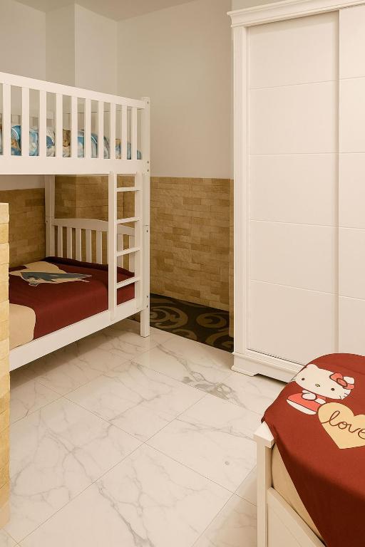 A bed or beds in a room at Luxurious Chalet in Port Said Governorate Stunning Views