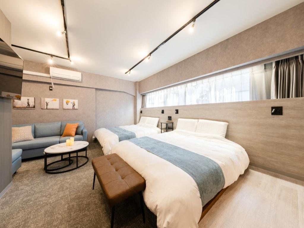 Voodi või voodid majutusasutuse Akihabara Sta 13min, Kanda Sta 10min,Ogawamachi 2min,Hotel Prime Inn Kanda, toas