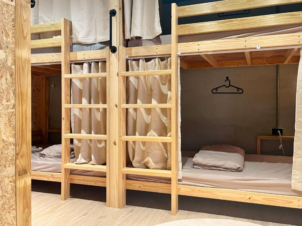 Postel nebo postele na pokoji v ubytování Sunset Hostel