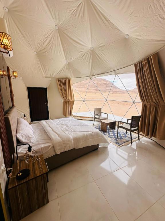 Krevet ili kreveti u jedinici u okviru objekta RUM MAGIC SANDS BuBBLES CAMP