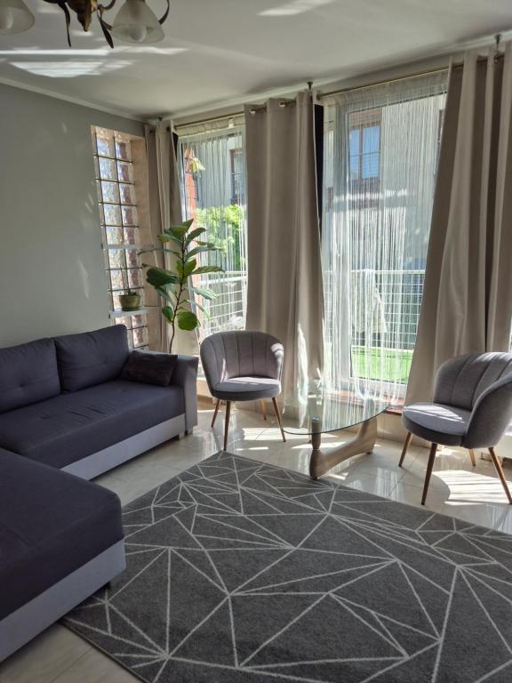 Posezení v ubytování Apartament z tarasem Zeta Park