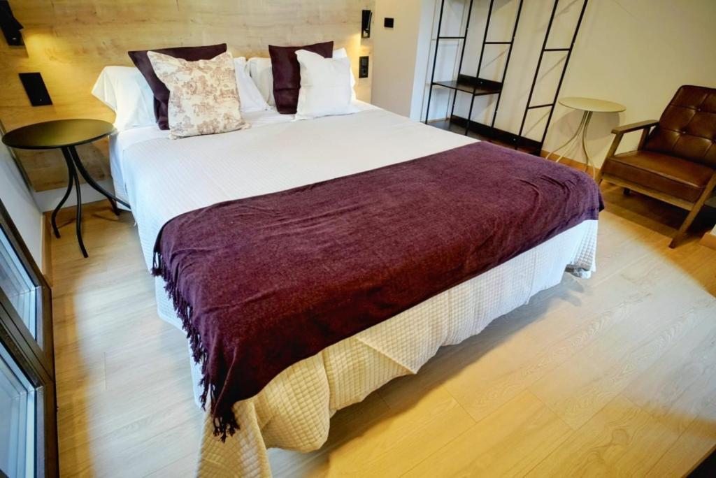 Postel nebo postele na pokoji v ubytování Hotel Casa Peix