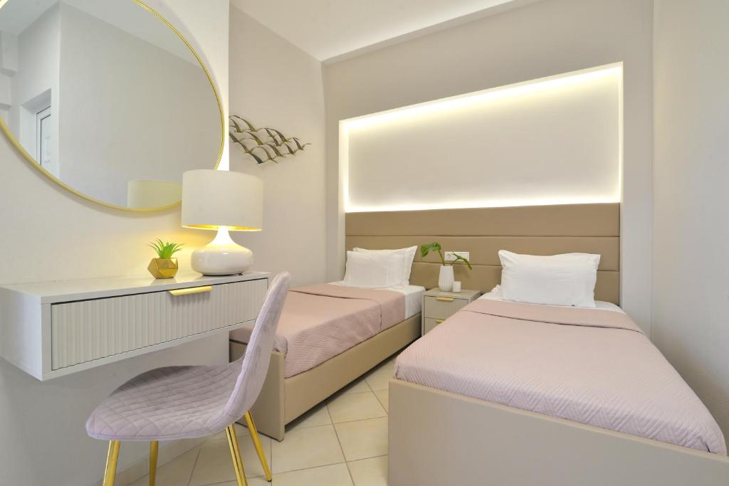 Postel nebo postele na pokoji v ubytování Irida Apartments