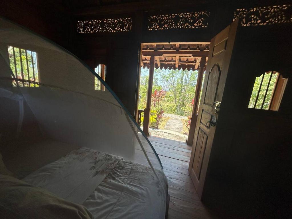 Postel nebo postele na pokoji v ubytování Parlezo Cottage Dintor
