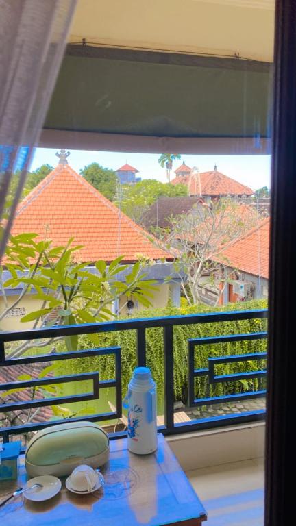 Balkón nebo terasa v ubytování Ariartha homestay