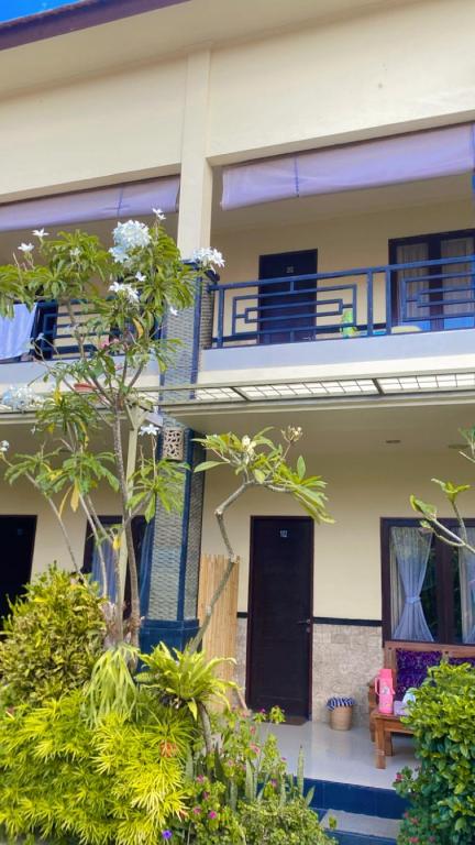Balkón nebo terasa v ubytování Ariartha homestay