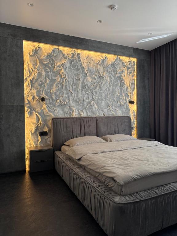 Postel nebo postele na pokoji v ubytování mini-hotel Neptun