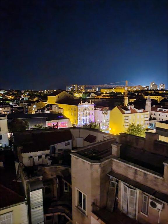 a view of a city at night with buildings at Old town hesed in Split