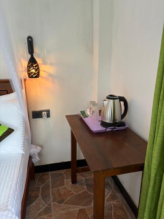 Postel nebo postele na pokoji v ubytování Little Hideaway Guest Home