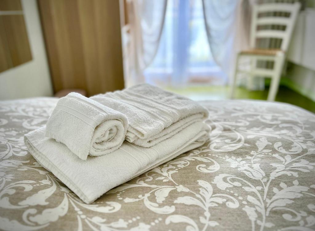 Postel nebo postele na pokoji v ubytování Bed&Breakfast Villa Lorena