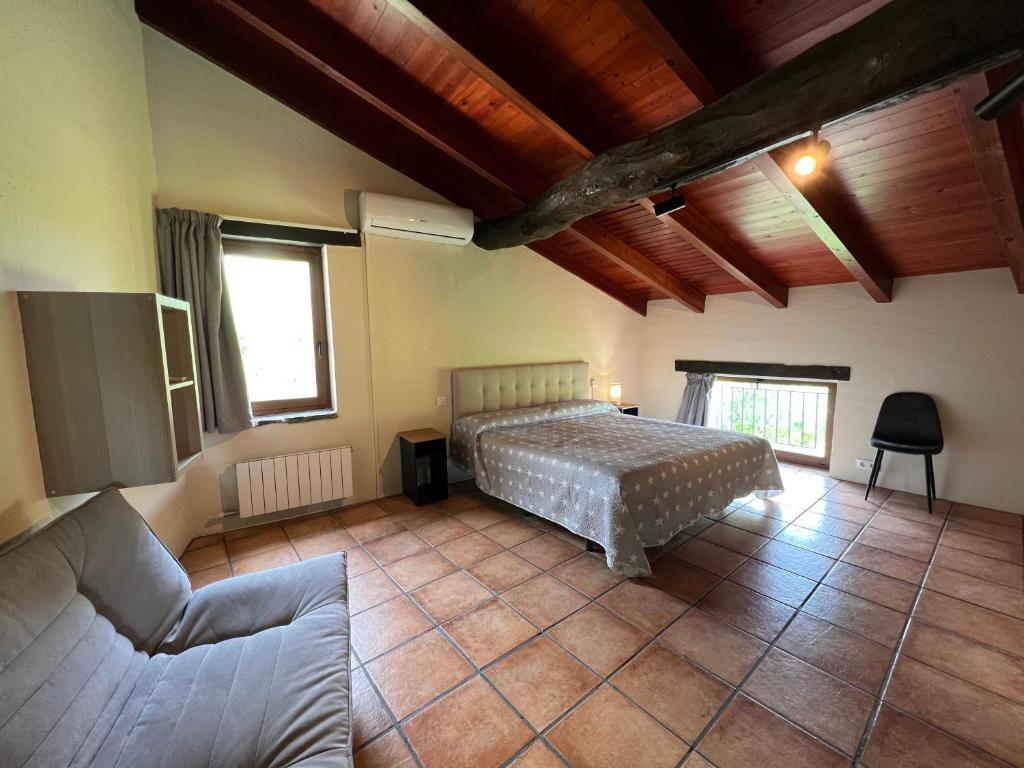 Postel nebo postele na pokoji v ubytování Casa Vella del Cuní