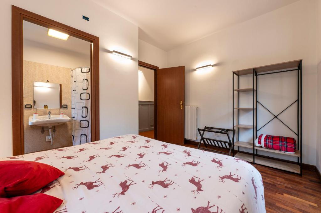 Postel nebo postele na pokoji v ubytování Rifugio Giuliano Marini