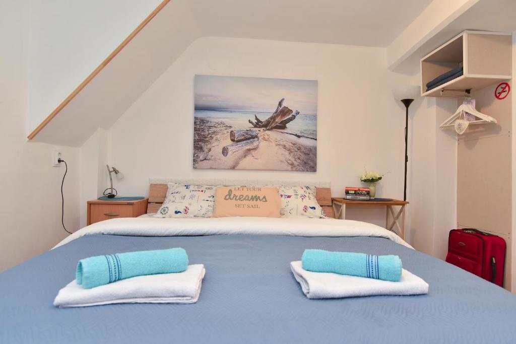 Postel nebo postele na pokoji v ubytování Sailor House