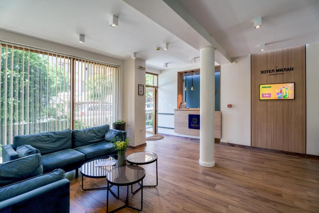 TV a/nebo společenská místnost v ubytování Hotel Milan