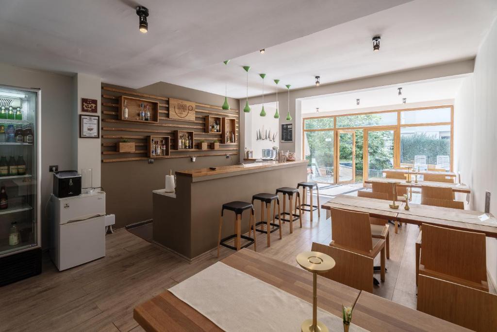Kuchyň nebo kuchyňský kout v ubytování Hotel Milan