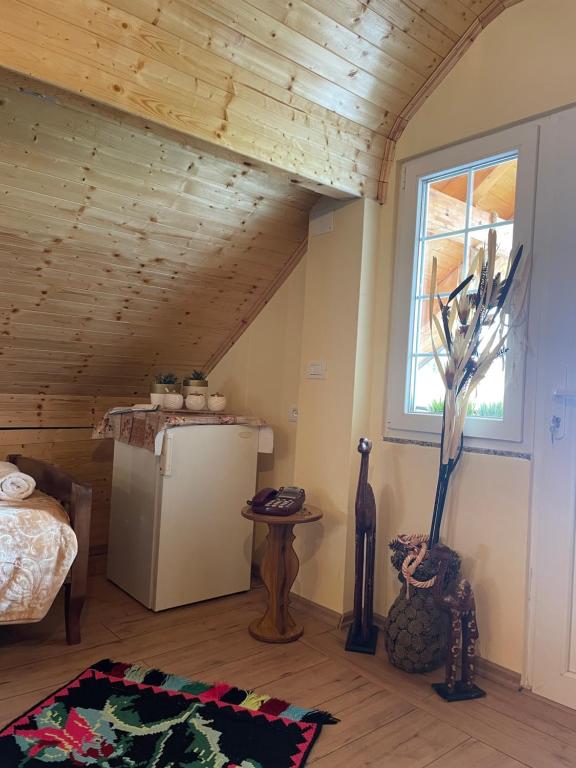Postel nebo postele na pokoji v ubytování Riza Guest House