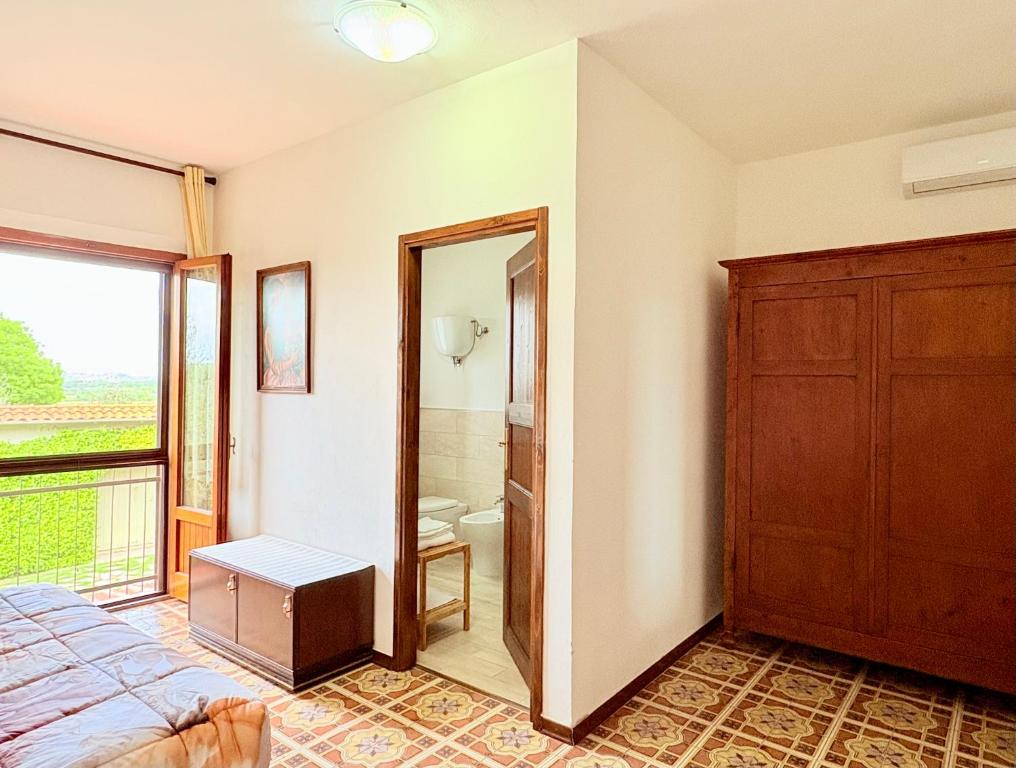 Postel nebo postele na pokoji v ubytování B&B Il Pozzo