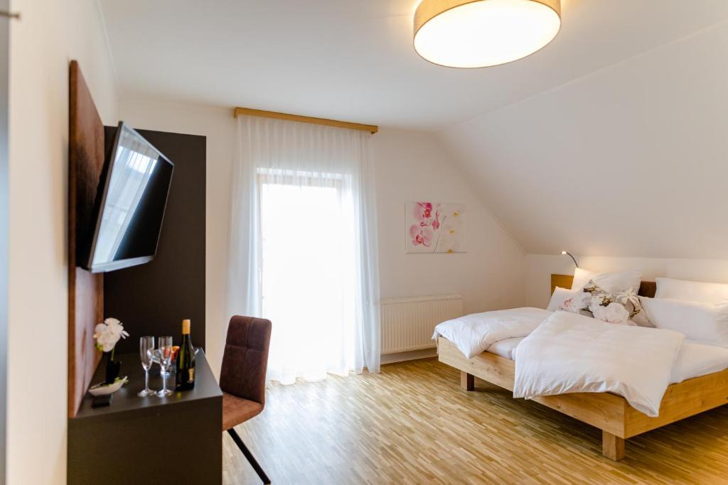 Postel nebo postele na pokoji v ubytování Gästezimmer Das Hambammer