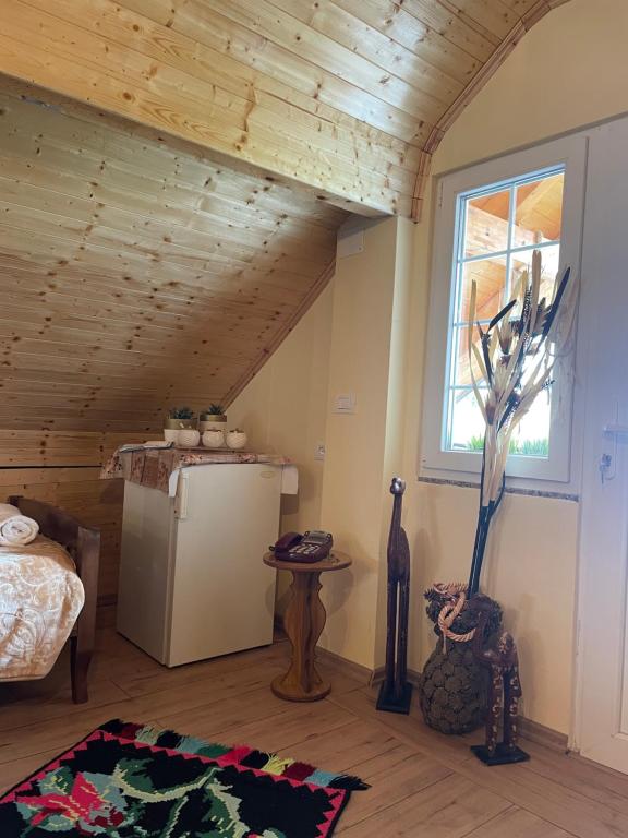 Postel nebo postele na pokoji v ubytování Riza Guest House