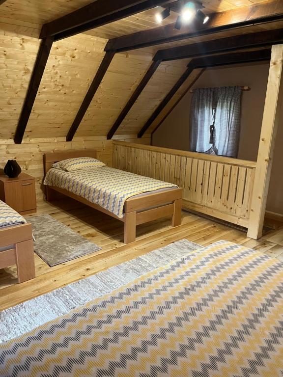 Postel nebo postele na pokoji v ubytování Apartments Bogdanović