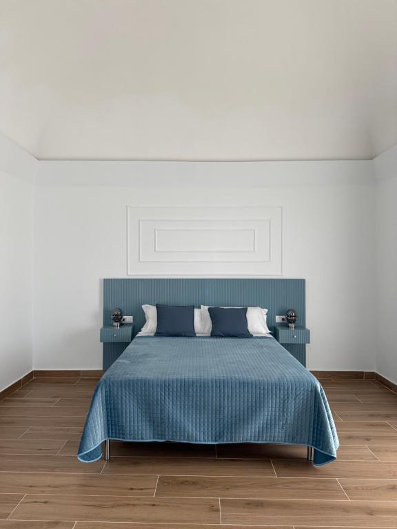 En eller flere senge i et værelse på Umbrella House