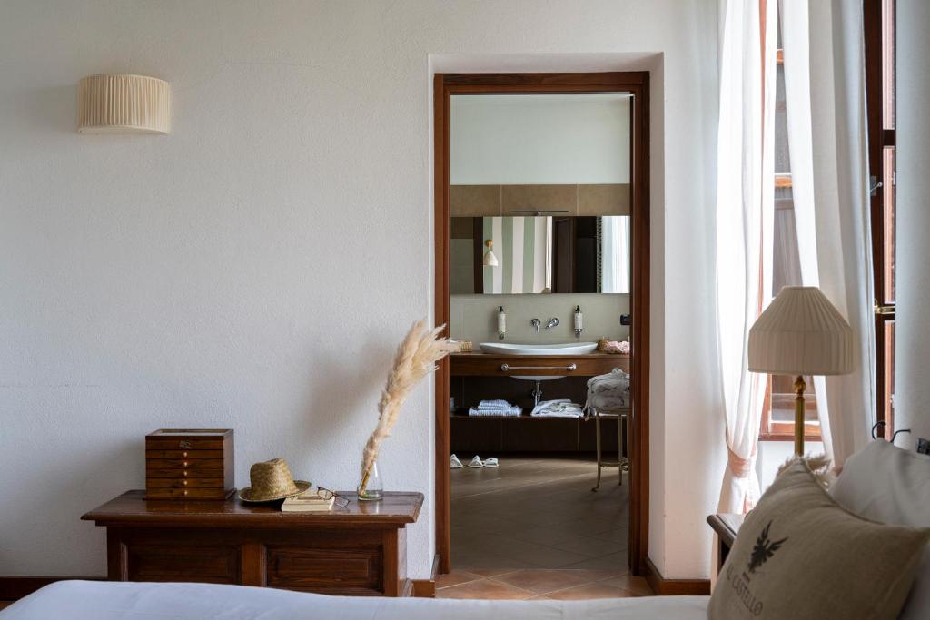 Postel nebo postele na pokoji v ubytování Al Castello Resort