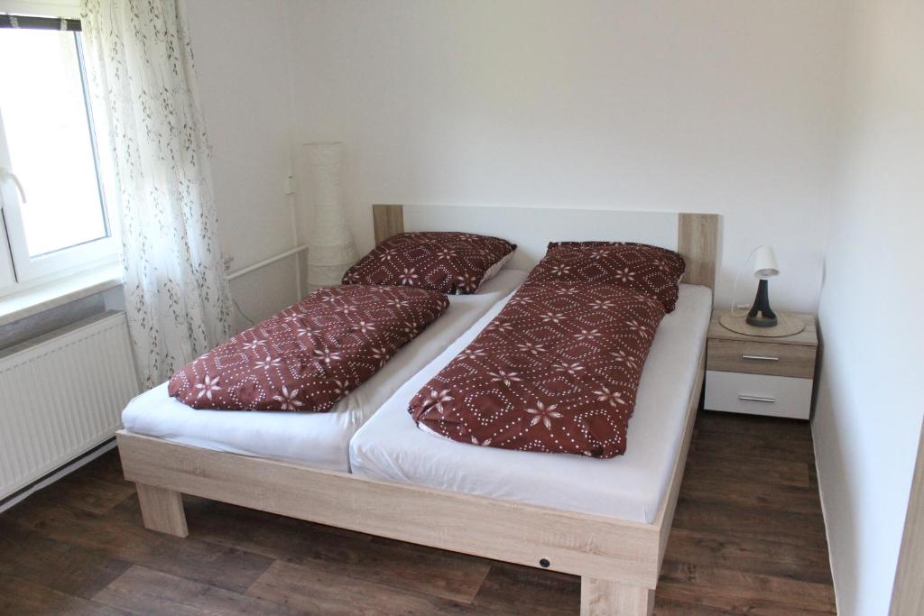 Postel nebo postele na pokoji v ubytování Chalupa pod Lysou horou