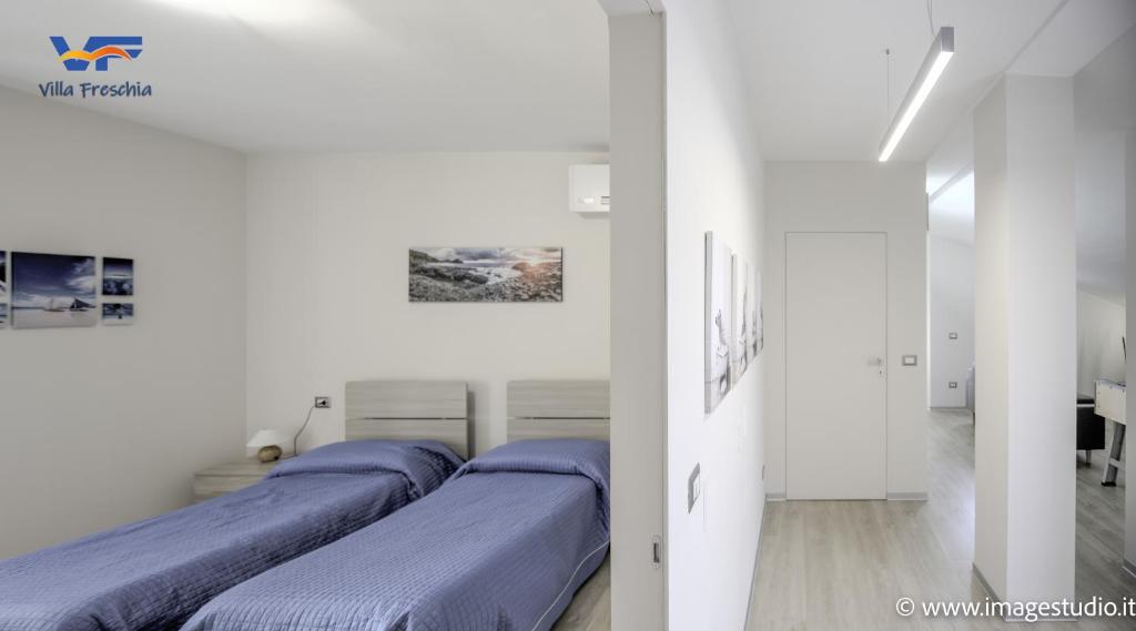 A bed or beds in a room at Villa Freschìa