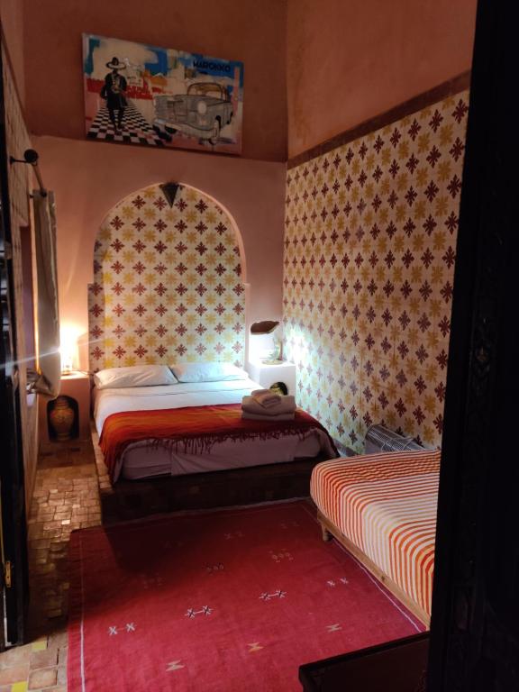 Postel nebo postele na pokoji v ubytování Riad Menthe Et Citron