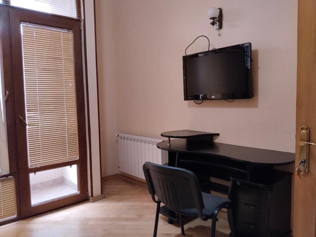 TV a/nebo společenská místnost v ubytování Villa Vanila