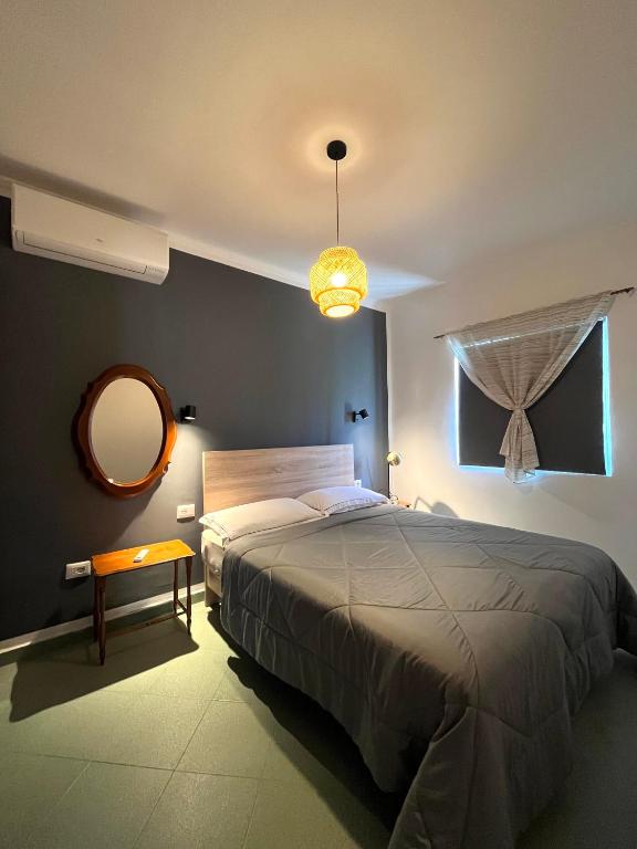 Katil atau katil-katil dalam bilik di Seaside Cottage with Garden