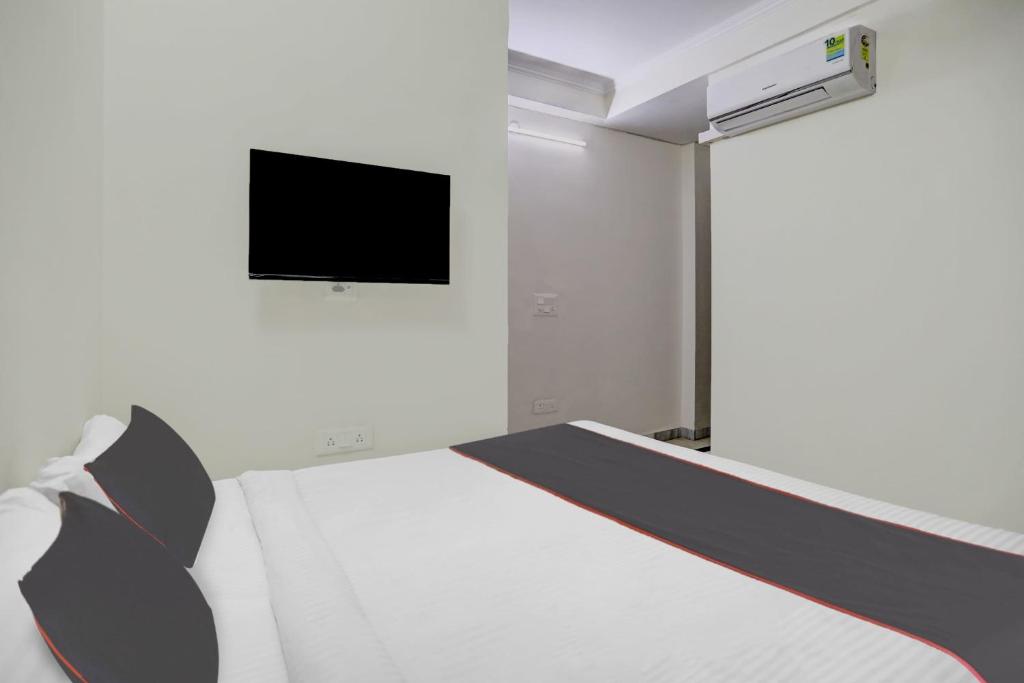 Fotografie z fotogalerie ubytování Capital O Uk House Residency v destinaci Gurgáon