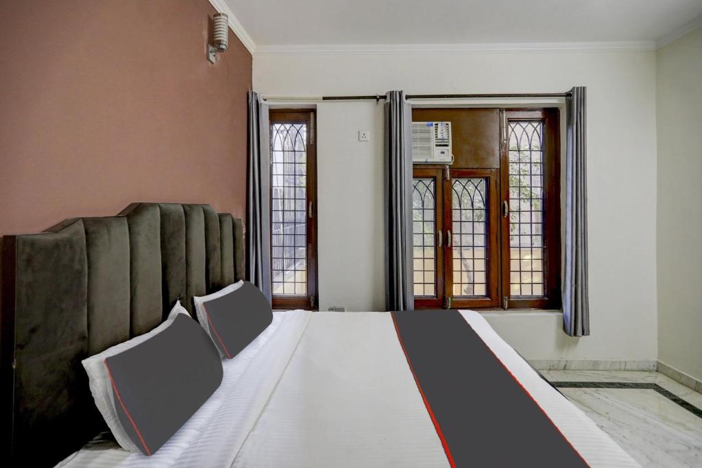 Fotografie z fotogalerie ubytování Capital O Uk House Residency v destinaci Gurgáon