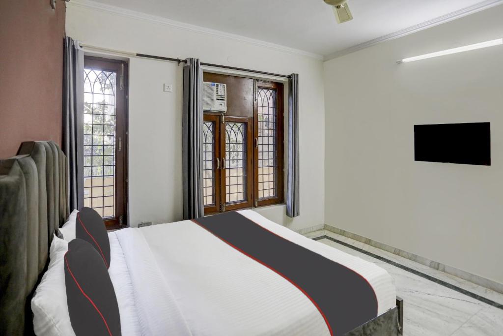 Fotografie z fotogalerie ubytování Capital O Uk House Residency v destinaci Gurgáon