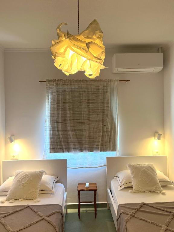 Katil atau katil-katil dalam bilik di Seaside Cottage with Garden