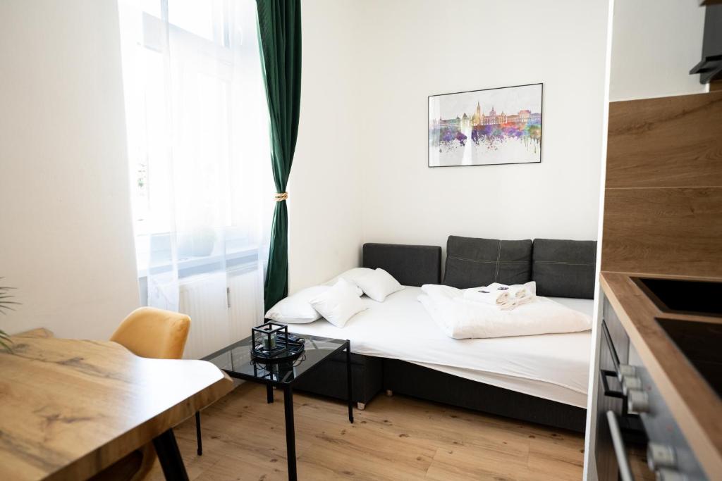 Postel nebo postele na pokoji v ubytování JS Design Apartment