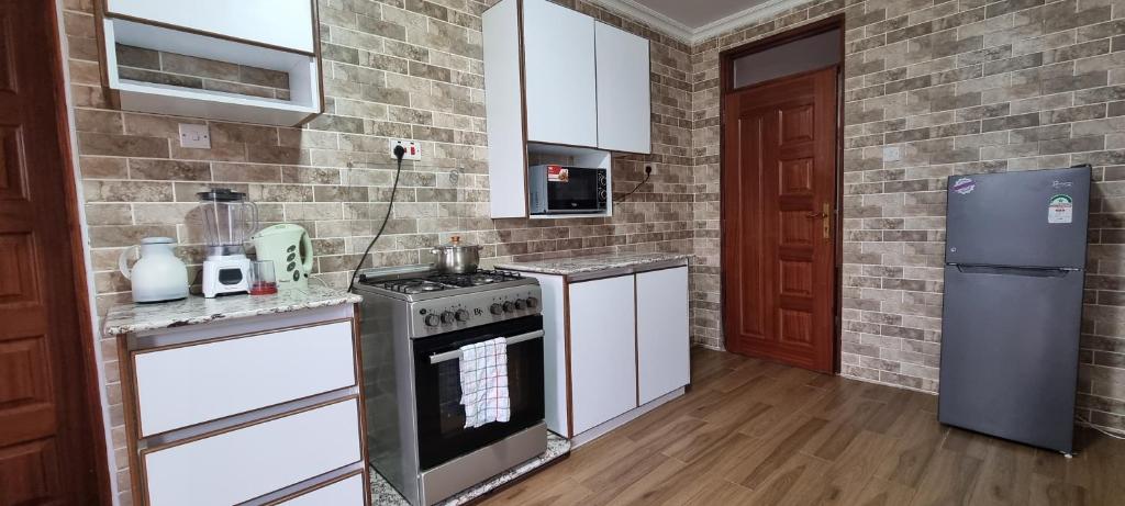 Kuchyň nebo kuchyňský kout v ubytování Casa Nadreya Home