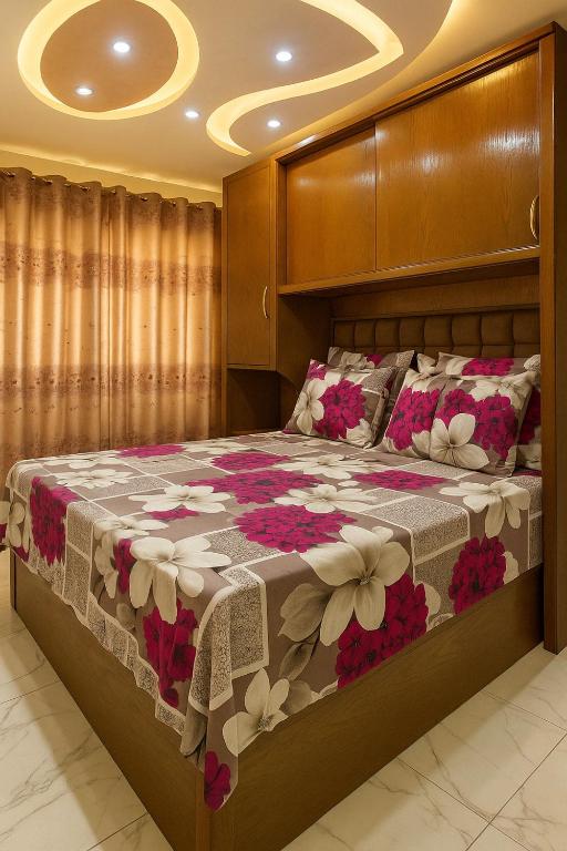 A bed or beds in a room at Porto Said Resort Rentals