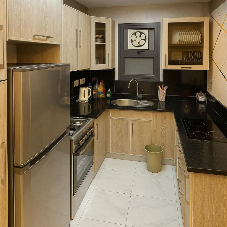 A kitchen or kitchenette at Porto Said Resort Rentals