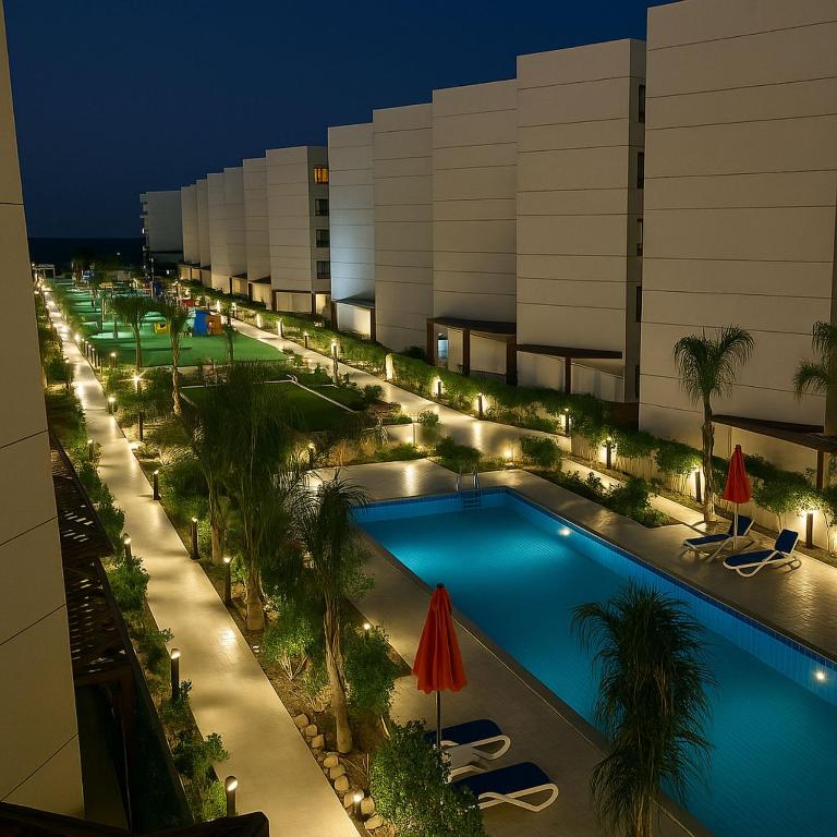 The swimming pool at or close to Porto Said Resort Rentals