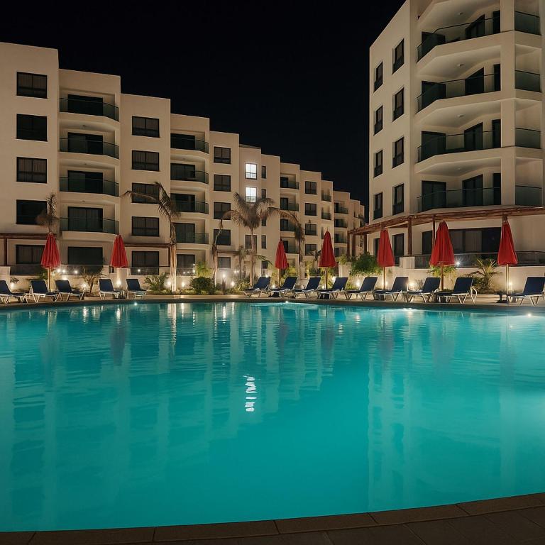 The swimming pool at or close to Porto Said Resort Rentals