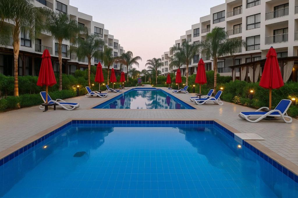 The swimming pool at or close to Porto Said Resort Rentals