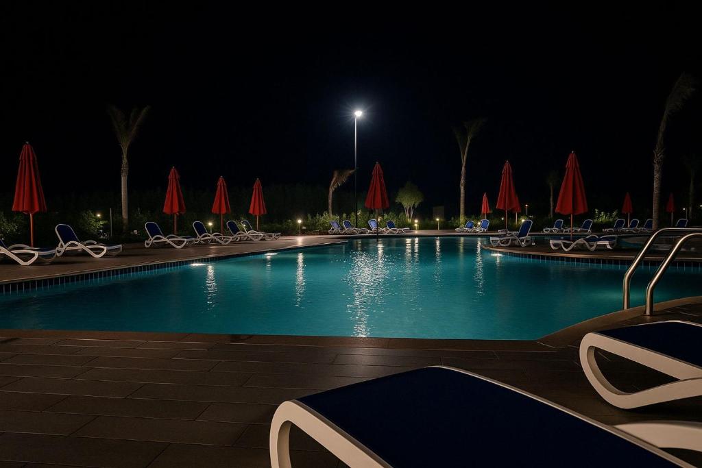 The swimming pool at or close to Porto Said Resort Rentals
