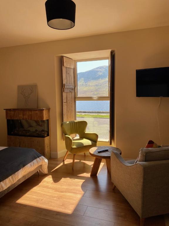 TV a/nebo společenská místnost v ubytování Kylemore House Boutique Apartments - Nancy's Drift