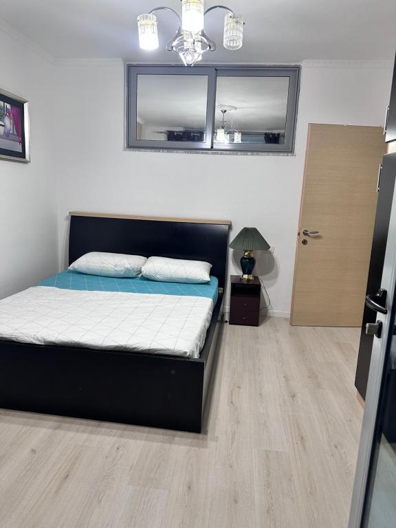 Postel nebo postele na pokoji v ubytování Apartament Arena 2
