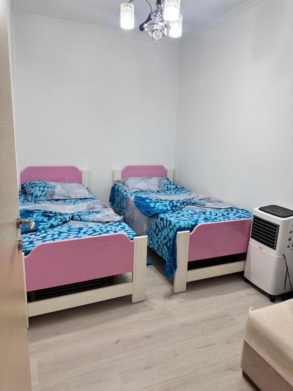 Postel nebo postele na pokoji v ubytování Apartament Arena 2