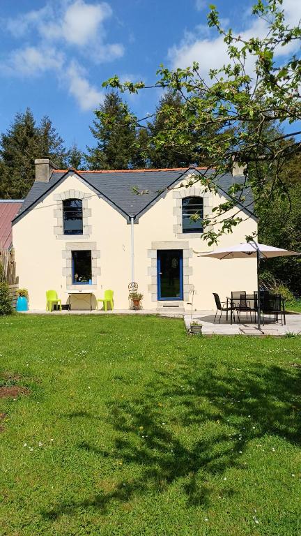 Κήπος έξω από το La maison au cœur de la forêt