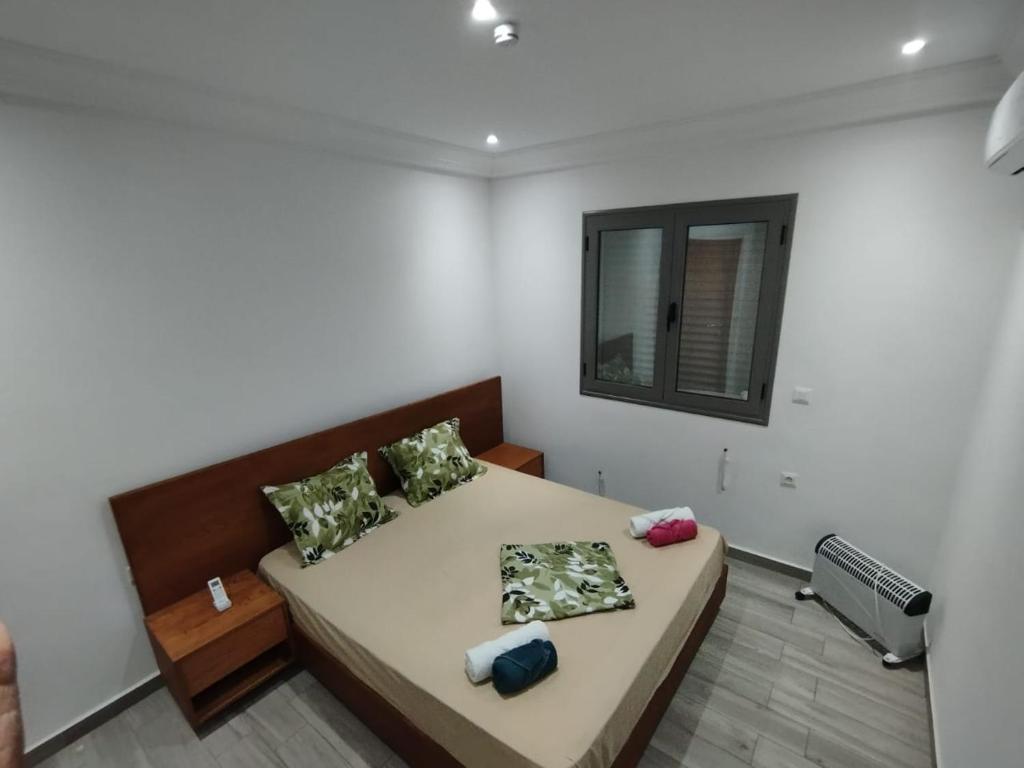 Postel nebo postele na pokoji v ubytování Résidence Inès Djerba Appartement de Luxe
